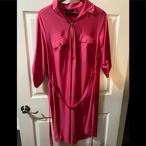 Size 1X dress but fits XL. Form fitting. Fun hot pink. Never worn.